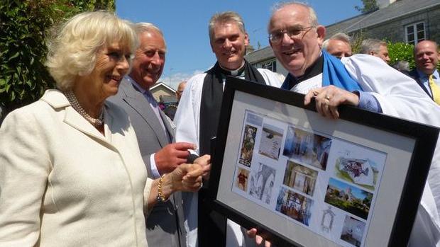 The Prince of Wales and the Duchess of Cornwall - now the King and Queen - surveying architects’ plans on a visit to the newly opened Galilee Chapel in 2015
