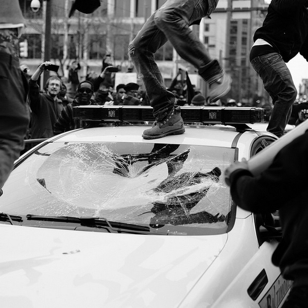 Several photojournalists in Baltimore have been arrested by police or assaulted by protesters. Allen says: 'My mother called me, and said "Boy, why are you on the front lines like that?" I had to calm her down and tell her I'm okay. I know what I'm doing. I know that if I get the right shot at the right time, I can show people things they don't see on the news.'