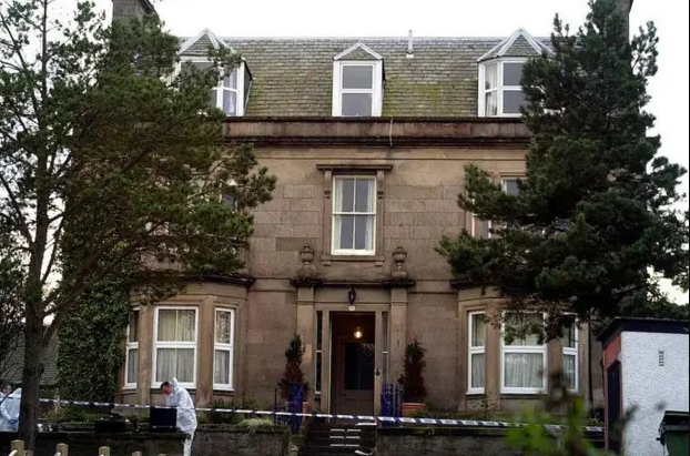 Forensic officers outside the Wilson home after the shooting