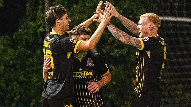 Briton Ferry Llansawel celebrate Ruben Davies' goal