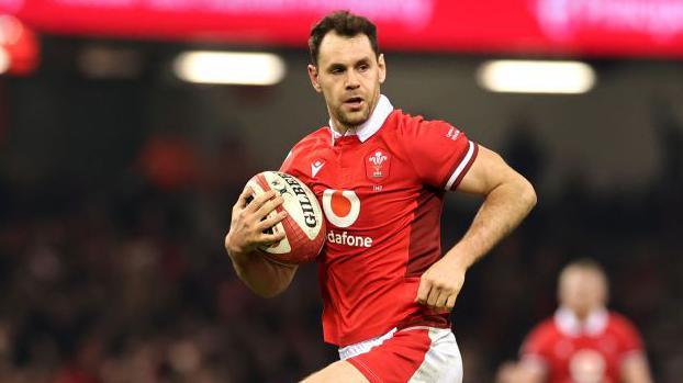 Tomos Williams running with the ball during the Six Nations for Wales