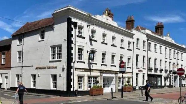 An image from the street of the pub, which is a three-storey white Victorian building