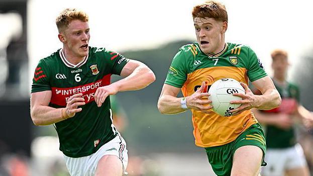 Donegal's Ciaran Moore and Mayo's David McBrien