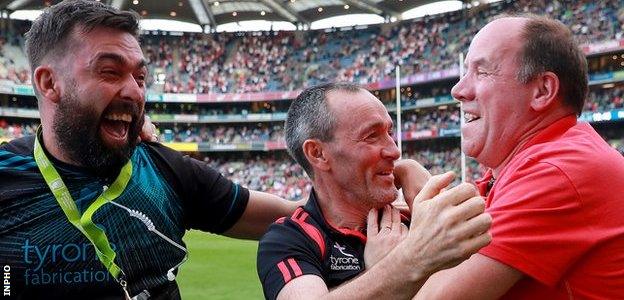 Brian Dooher and Feargal Logan celebrate