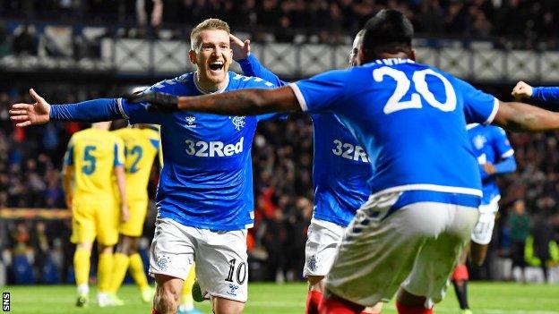 Steven Davis celebrates with Rangers team-mate Alfredo Morelos