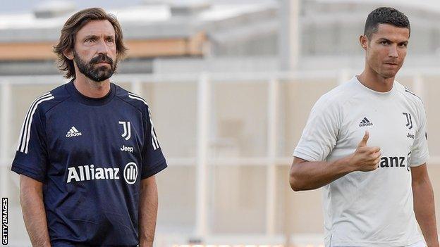 Andrea Pirlo and Cristiano Ronaldo at a training session