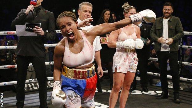 Natasha Jonas celebrates winning her third world title