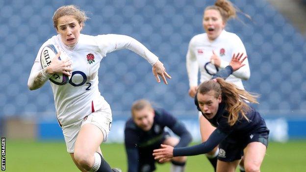 England's Abby Dow runs with the ball