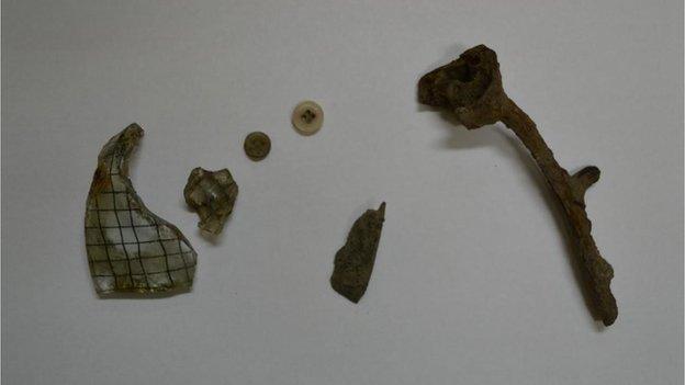 Items supposedly taken at the former Auschwitz death camp by two British schoolboys.