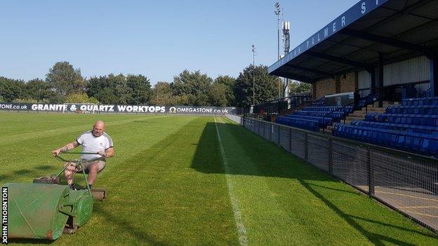 John Thornton cuts the pitch at Farsley Celtic