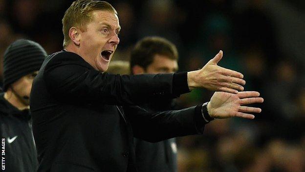 Swansea manager Garry Monk gesticulates tom his players