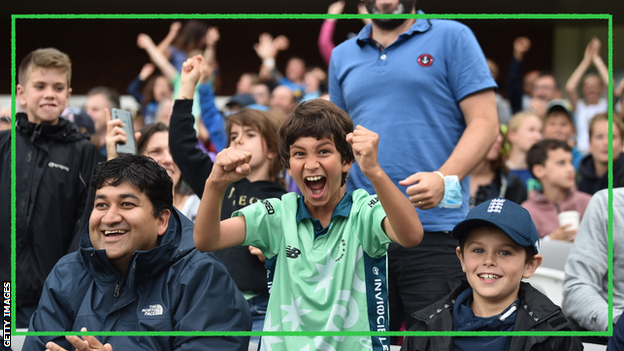 Young fan celebrates