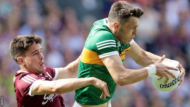 David Clifford gets out in front of Galway skipper Sean Kelly to win possession at Croke Park