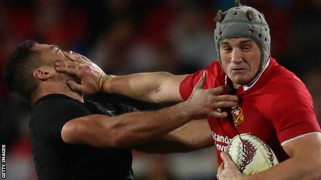 Jonathan Davies hands off New Zealand's Anton Lienert-Brown in the 2017 Lions first Test defeat by New Zealand