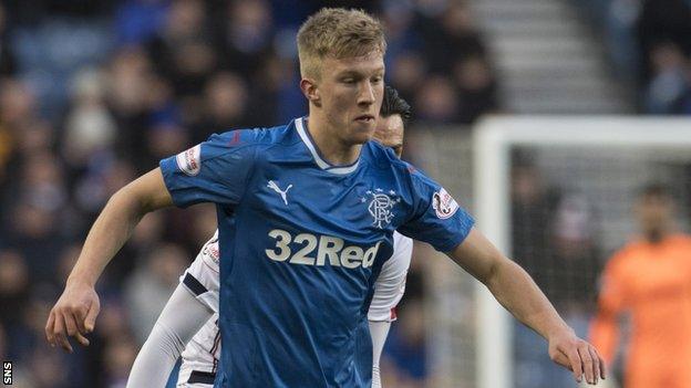 Ross McCrorie in action for Rangers against Ross County