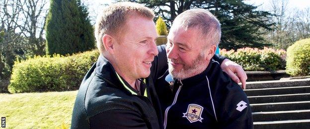 Neil Lennon and Ally McCoist embrace