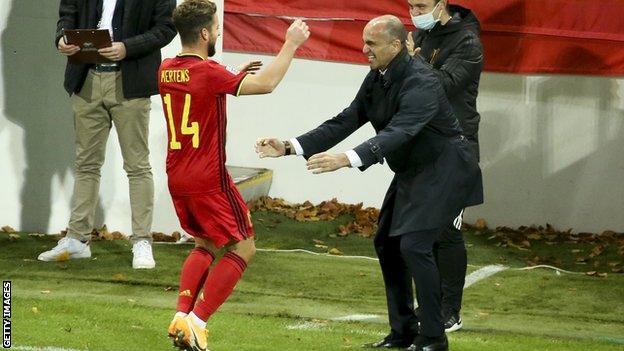 Dries Mertens celebrates with Roberto Martinez after scoring in Belgium's Nations League win over England in November 2020