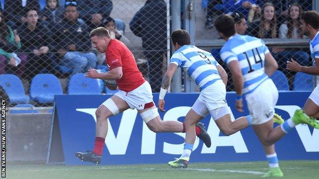 Flanker James Davies races through for Wales' first try against Argentina