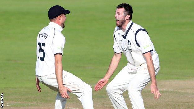 Warwickshire captain Will Rhodes (left) celebrated with England's Dom Sibley as he became the seventh Bears captain to lead his team to the title