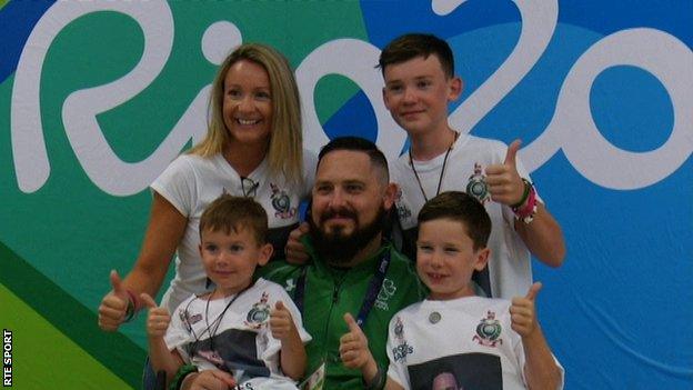 Phillip Eaglesham with his wife Julie and sons Mason, Travis and Tyler after competing in Rio on Tuesday