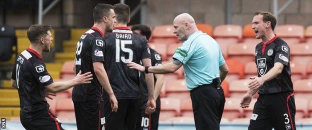 St Mirren players and referee Craig Charleston