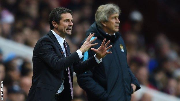 Remi Garde (left)