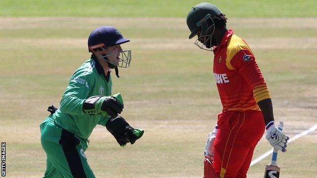 Ireland's Niall O'Brien and Solomon Mire of Zimbabwe in action in Harare