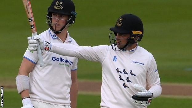 Tom Haines celebrates