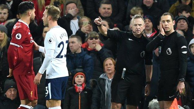 Referee Jon Moss and his assistant Edward Smart