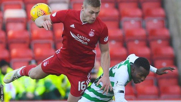 Eight of Aberdeen's players, and Celtic's Boli Bolingoli (right) breached lockdown rules