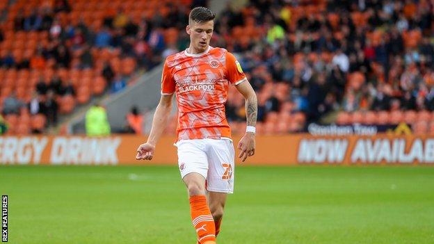 Oliver Casey playing for Blackpool