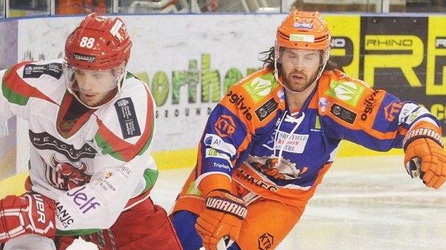 Joey Martin controls the puck against Sheffield Steelers