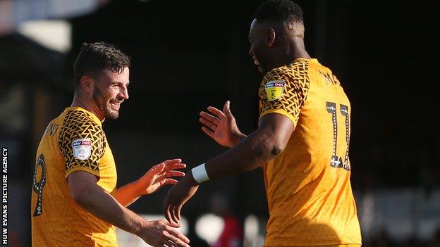 Padraig Amond celebrates after scoring Newport's first goal