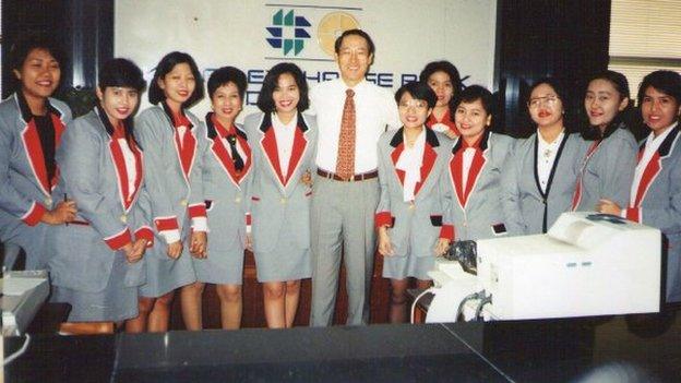 Shandra and her colleagues at the Indonesian bank