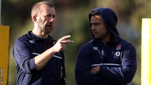 Te'o (right) chats with team doctor Nigel Jones