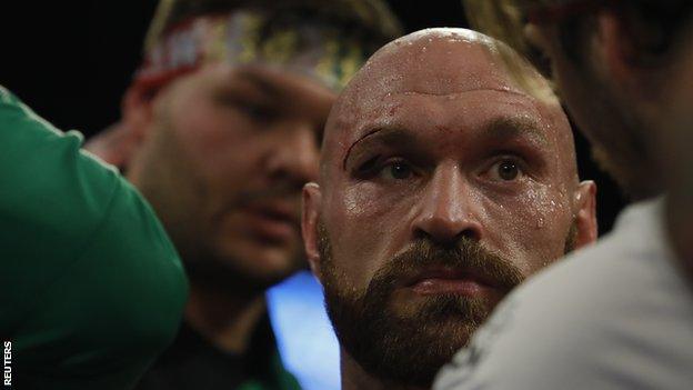 Tyson Fury displaying a deep cut above his right eye