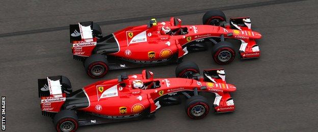 Ferrari drivers Kimi Raikkonen and Sebastian Vettel