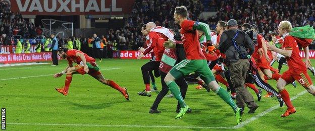 Wales players celebrate at the end of a historic Euro 2016 qualifying campaign