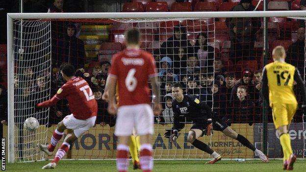 Mikael Mandron scores his first penalty against Lincoln