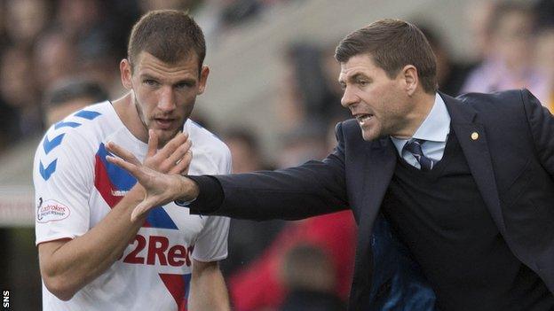 Rangers' Borna Barisic receives instructions from Steven Gerrard