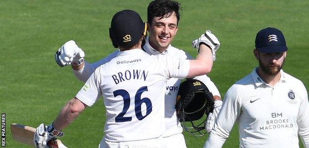 Sussex batsman Tom Haines celebrates a landmark in his innings against Middlesex