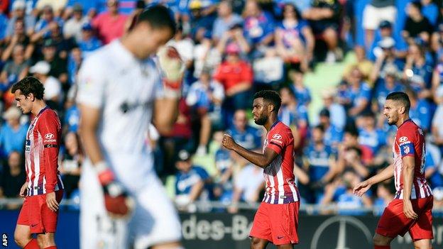 Atletico Madrid's players celebrate scoring against Getafe
