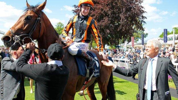 Racehorse trainer Hughie Morrison (right) congratulates Oisin Murphy after Telecaster had won the Al Basti Equiworld Dubai Dante Stakes at York in May