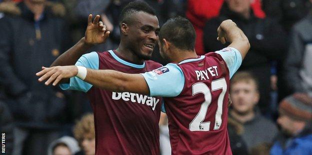 Emmanuel Emenike and Dimitri Payet