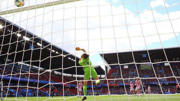 Scotland's Lee Alexander is beaten by Mana Iwabuchi's shot to score for Japan