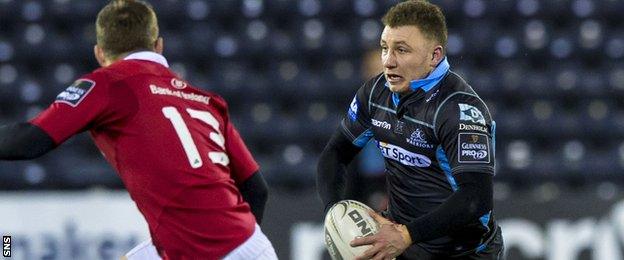 Duncan Weir runs with the ball for Glasgow against Munster