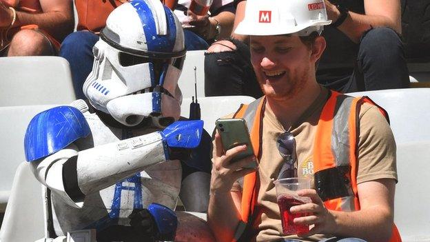 Fans enjoy the Rugby Sevens World Cup in Cape Town