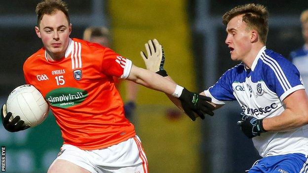 Armagh's Conor Martin in possession against Niall Rooney of Monaghan