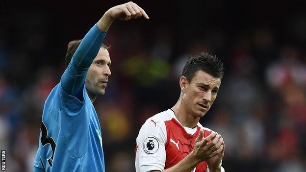 Arsenal centre-back Laurent Koscielny (right)