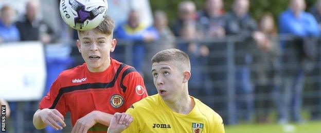 Londonderry's Jack Malone battles with Antrim's Paul O'Neill on Wednesday